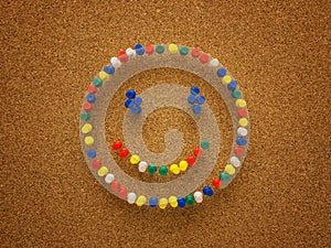 Thumbtack smiley face