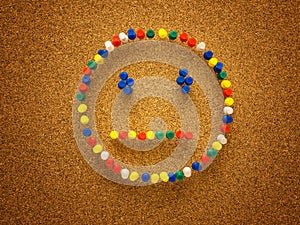 Thumbtack smiley face