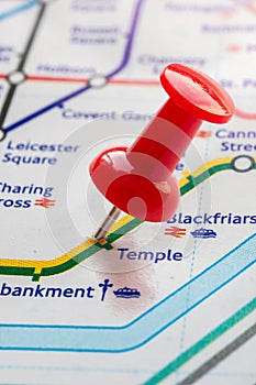 Thumbtack on Temple station in london underground map