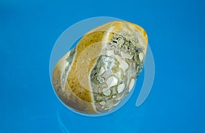 A thunder egg as tumbled gemstone and healing stone