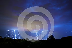 Thunder, lightning and storm in dark night sky