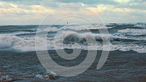 Thunder storm waves crashing on the beach