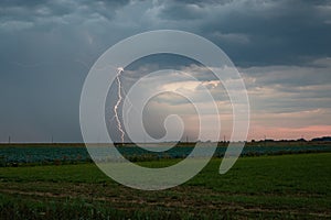 Thunderbolt on the plains at dusk