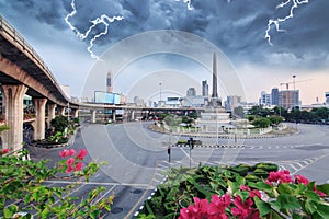 Thunderclap with black cloud at victory monument landmark