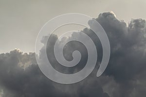 Thunderclouds. The sky after the rain. Beautiful clouds. Dramatic thunderstorm clouds with sun rays