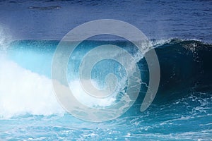 Thundering sea wave rolling, turquoise blue water