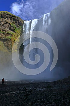 Thundering Skogafoss Waterfall from Inner Gorge in Morning Light, Southern Iceland photo