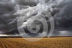 Thunderstorm above fields.