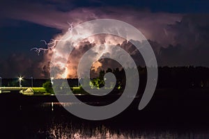 Thunderstorm cloud early in the morning, in summer before sunrise