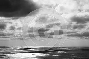 Thunderstorm with dark clouds over the ocean