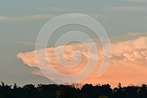 thunderstorm front in sun set big cloud cumulonimbus germany