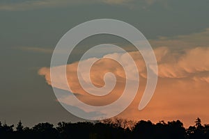 thunderstorm front in sun set big cloud cumulonimbus germany