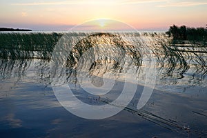 Thunderstorm with lightning on the lake.