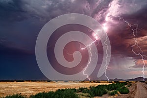 Thunderstorm lightning strikes at sunset