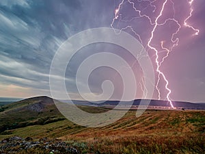 Thunderstorm with lightnings over the fields