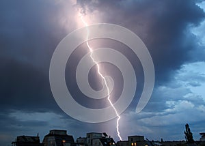 Thunderstorm lights. Bright lightning thunderstorms sparkle from the cloud. Dangerous electrical flash. Levin or scintillation. photo