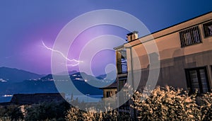 Thunderstorm in the night: Lightning on the sky, neighbourhood, Italy