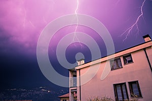 Thunderstorm in the night: Lightning on the sky, neighbourhood, Italy