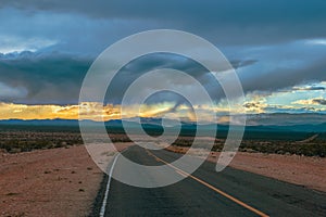 Thunderstorm over the empty  road in Valley of Fire State Park.Nevada.USA