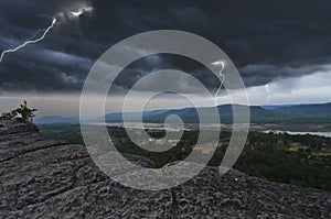 Thunderstorm over the river and forest