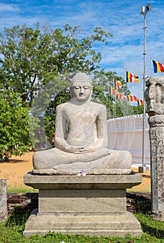 Thuparama Sitting Buddha statue, a world heritage site in the sacred city of Anuradhapura