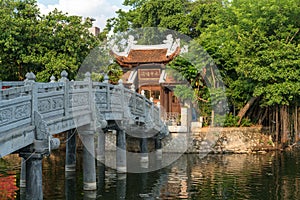 Thuy Trung Tien temple with stone bridge on Thanh Nien street in Hanoi, Vietnam