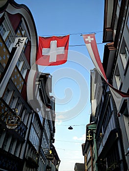 Thw Switzerland flag is waiving in Appenzell town