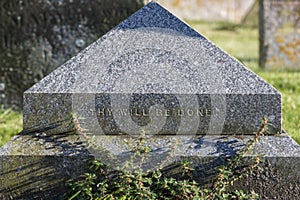 Thy will be done. Religious text inscription on graveyard tombstone. photo
