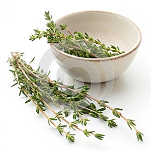 Thyme sprigs in a ceramic bowl