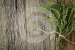 Thyme on Wood Background