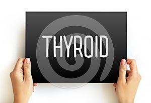 Thyroid text on card, concept background