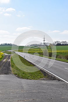 ThÃ¼r, Germany - 04 23 2021: Curvy road on the Eifel hills between ThÃ¼r and Welling