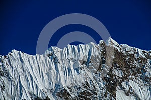 Tian Shan mountains snow peaks and steep slopes