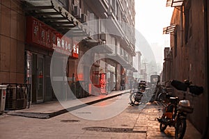 TIANJIN , CHINA - APRIL 13: Chinese street at sunset background