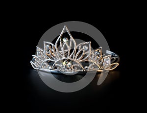 Tiara or diadem with colorful sparkles on black