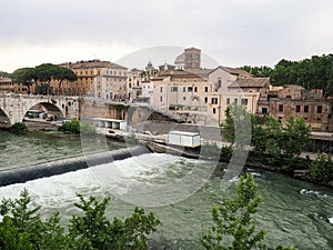Tiber Island and Cestius Bridge in Rome, Italy