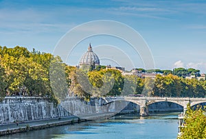 Tiber river with Saint Peter\'s dome on the background