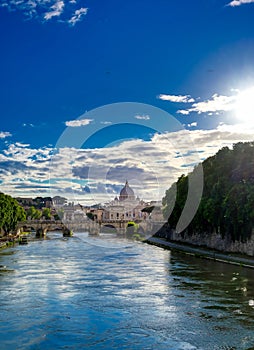 Tiber River towards St. Peter`s Basilica in Rome, Italy