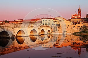 Tiberius' Bridge at sunset. Rimini, Italy