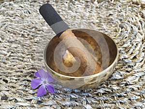 A tibetan bowl with a flower