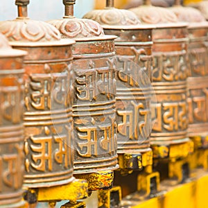Tibetan Buddhist prayer wheels at Boudhanath stupa in Kathmandu