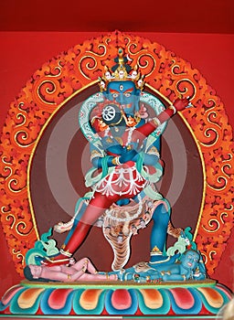 Tibetan deity Chakrasamvara on red background