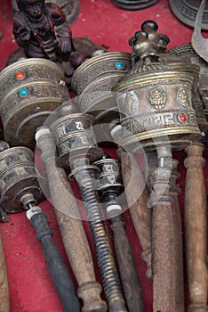 Tibetan Hand prayer wheels cylindrical with wooden handles assorted styles photo