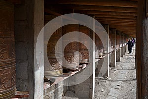 The Tibetan kora or pilgrimage and prayer wheels in Zoige, Amdo photo