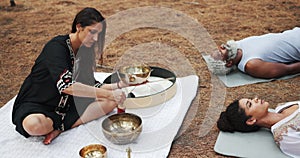 Tibetan, meditation and people with sound of singing bowl for indigenous spiritual healing in holistic practice. Soul