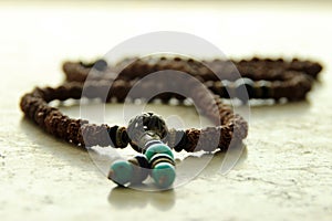 Tibetan prayer beads, arts and crafts background