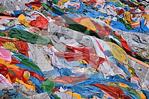 Tibetan prayer flags flutter in the wind.