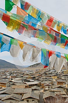 Tibetan prayer flags over shangri-la, china