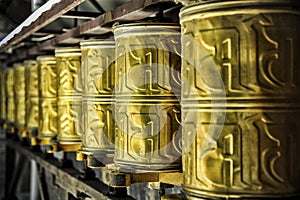 Tibetan Prayer wheels at the Mindroling Monastery - Zhanang County, Shannan Prefecture, Tibet Autonomous Region, China