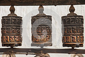 Tibetan prayer wheels or prayer's rolls of the faithful Buddhist